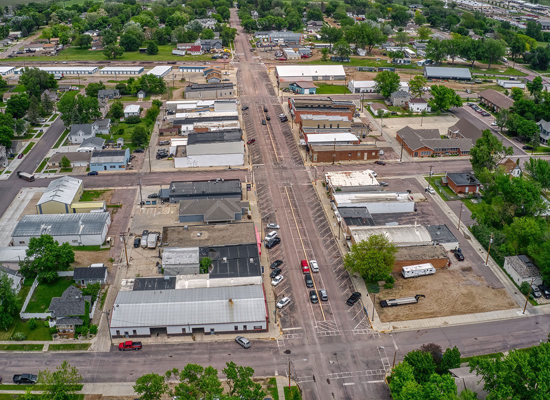 Lennox, SD - Aerial View of the Distant Sioux Falls Suburb of Lennox, South Dakota